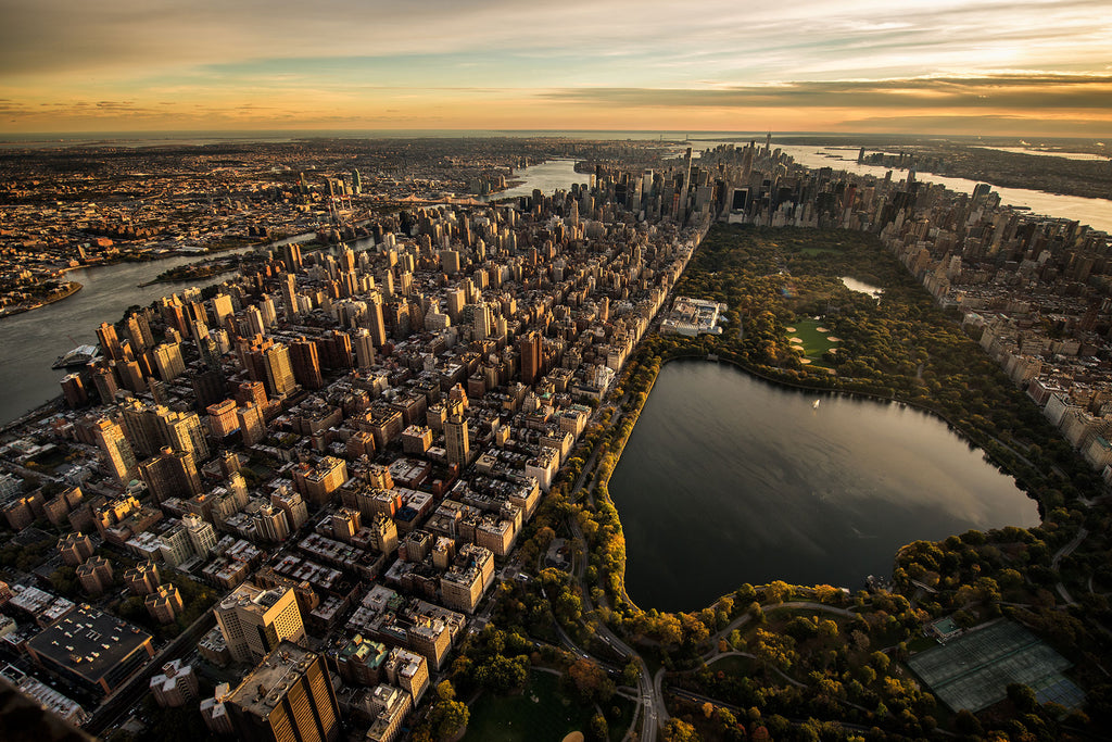 Fotografie des Central Park von oben bei Sonnenuntergang. Fotokunst online kaufen. Wandbild hinter Acrylglas oder als Poster