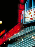 Architektur Fotografie von Neonlichtern bei einem Kino. Fotokunst und Bilder online kaufen. Wandbild hinter Acrylglas oder als Poster