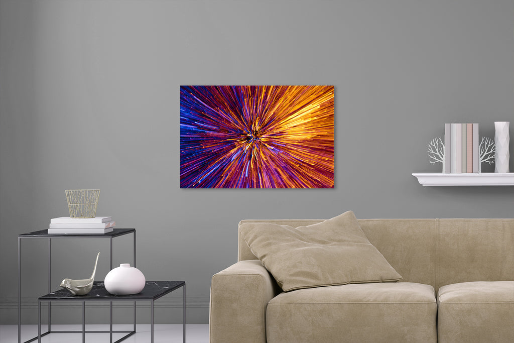 Aufgehängte Abstrakte Fotografie von einem Feuerwerk in gelb und blau. Fotokunst und Bilder online kaufen. Wandbild hinter Acrylglas oder als Poster